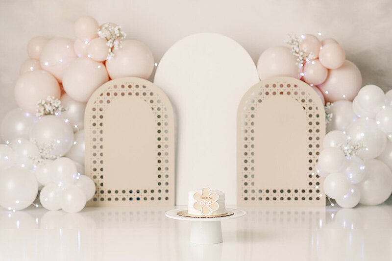 blush pink floral custom cake smash session in tampa florida by swapna fabbiano photography