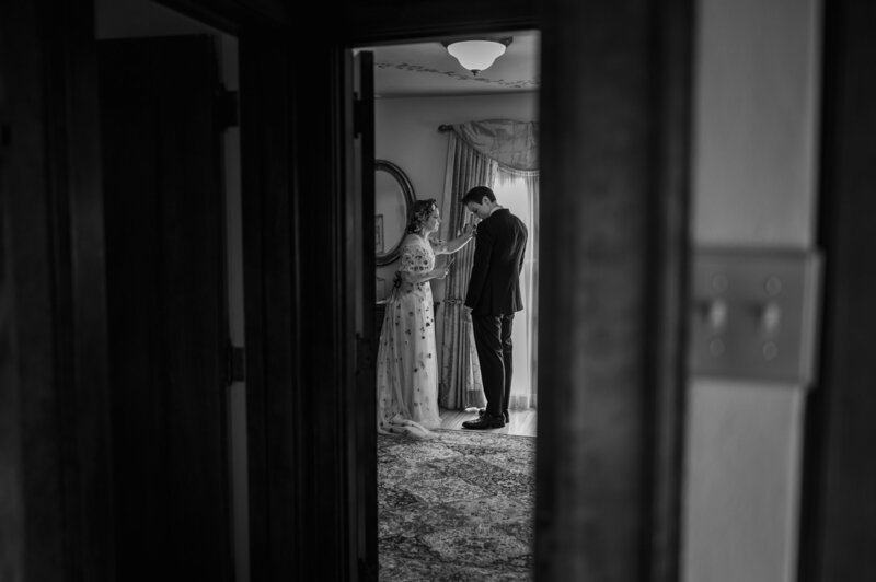 Bride and groom get ready before their wedding at The Grove Redfield Estate in Glenview, IL