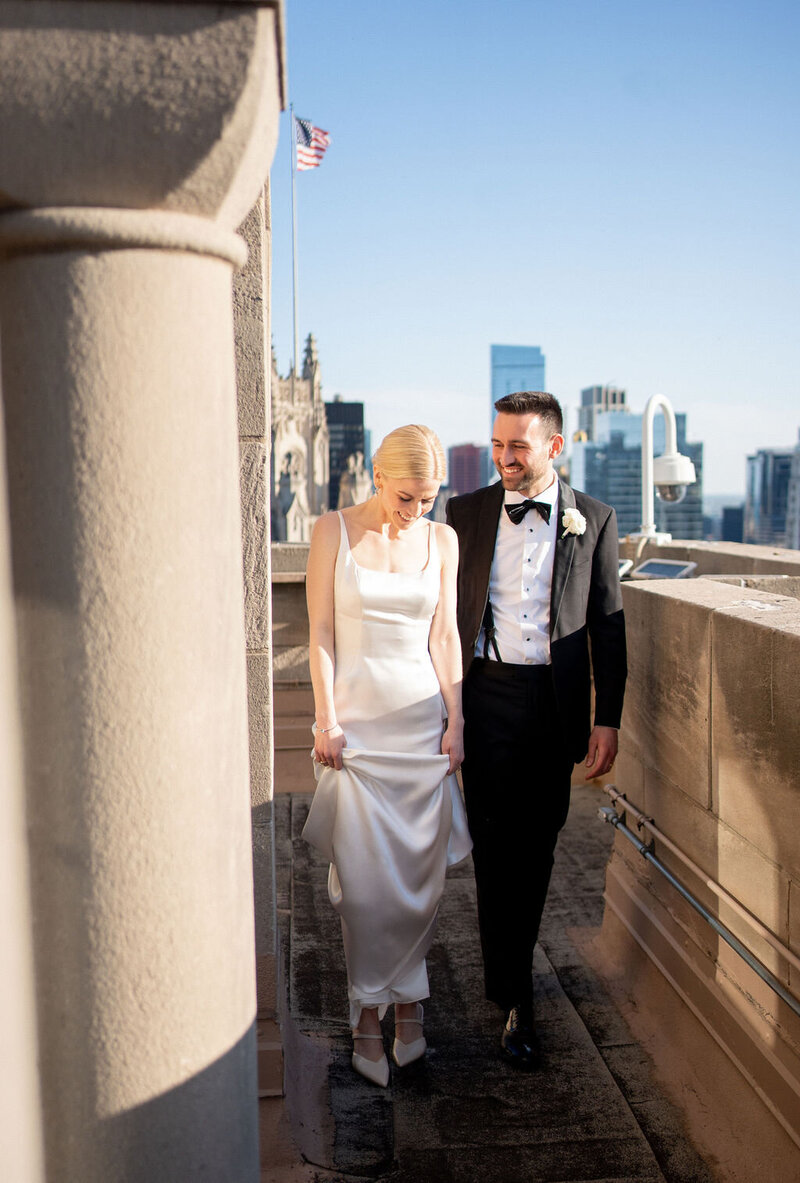 Groom kissing bride's hand, taken by chicago film wedding photographer Allison Francois