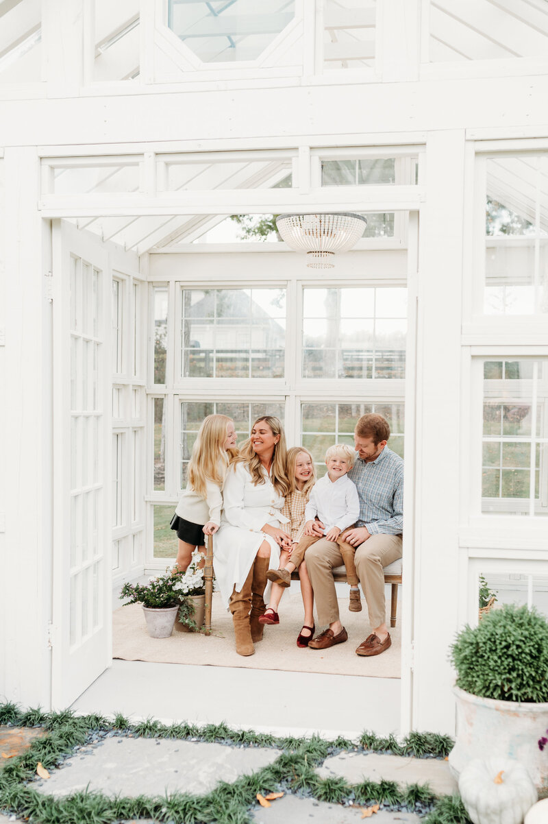 Family photography session in a greenhouse located in Atlanta