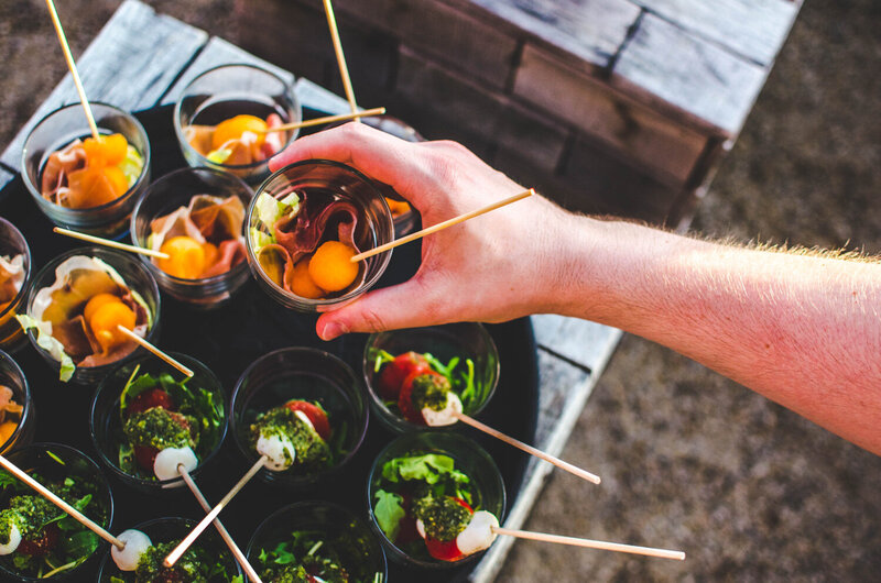 Food in glass grabbed by a hand