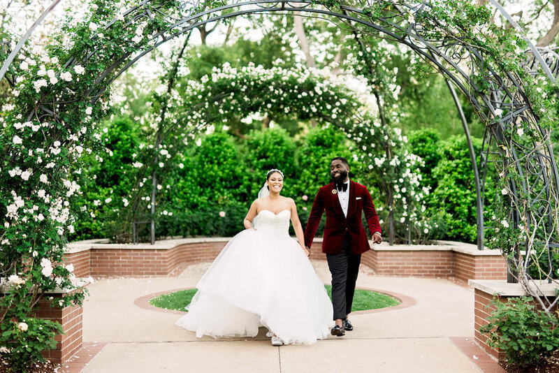 Swank Soiree Dallas Wedding Planner Kerri and Bravion at the Dallas Arboretum and Botanical Garden - Bride and Groom in a garden