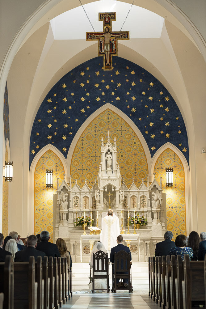 a wedding ceremony in a catholic church