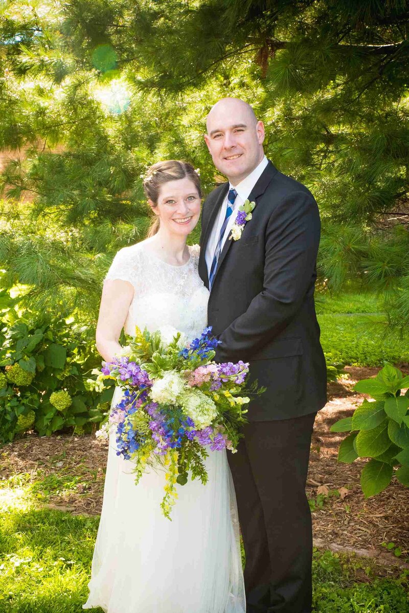 Bride and groom in garden at The Inn at 835 in Springfield IL