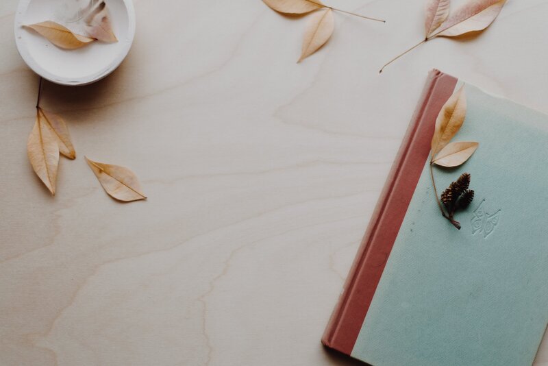 michele at desk with notebook