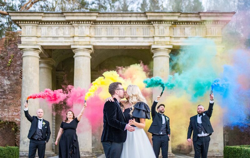 Bride and groom with smoke bombs UK