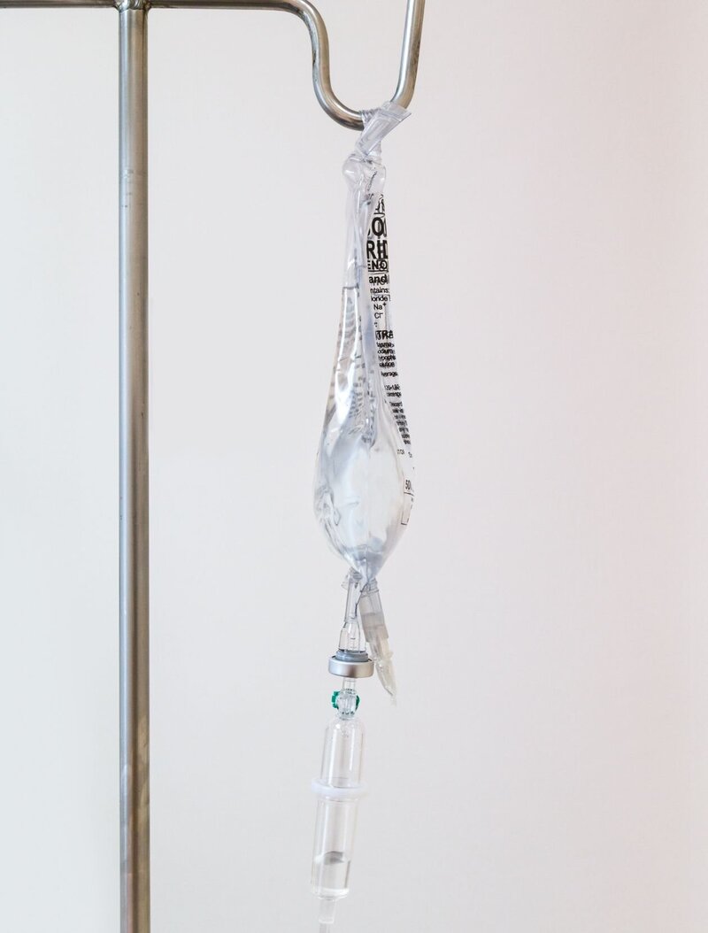 female hands drawing weight loss medication into syringe