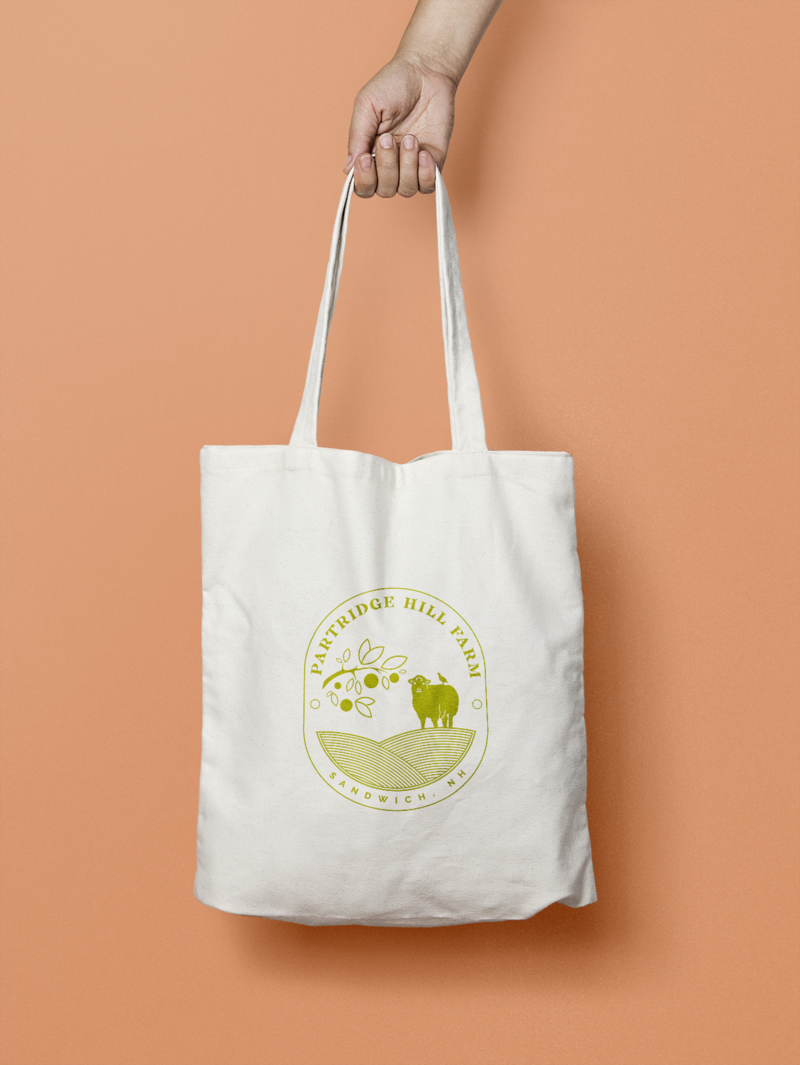 A sustainable canvas tote bag with branded logo to be sold in the local store.