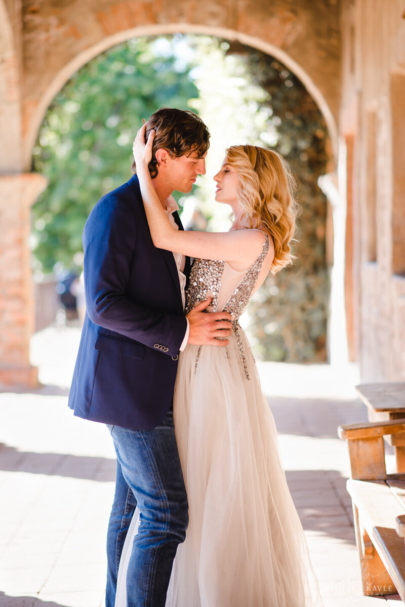 bride and groom embracing each other