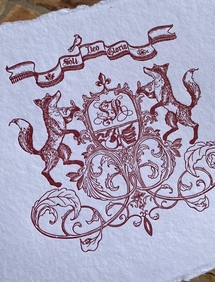 Red inked custom crest design calligraphy