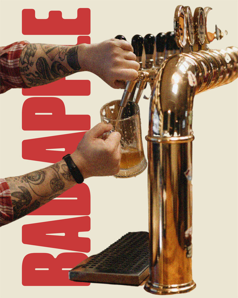 cutour imagery of a tattooed man pouring a beer from a tap and the logo for bad apple brewing