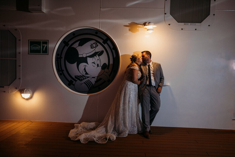 Groom Looks in the Mirror as He Gets Ready for His Tampa Bay Florida Wedding