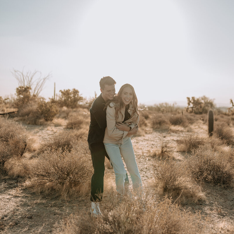couple wearing nike and converse and denim for engagement session in phoenix arizona