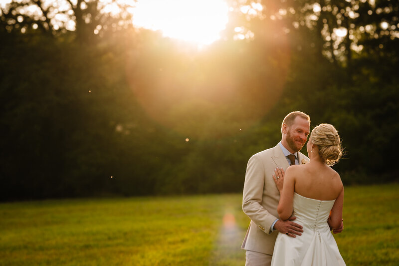 Bride and groom during couple time at sunset.