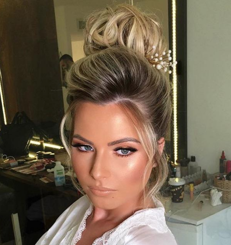 Woman with wedding hair and makeup done