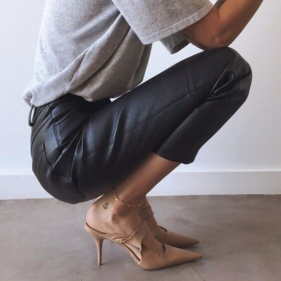 woman's fashion, oversized grey t-shirt, leather cropped pants and  camel leather mule heels.