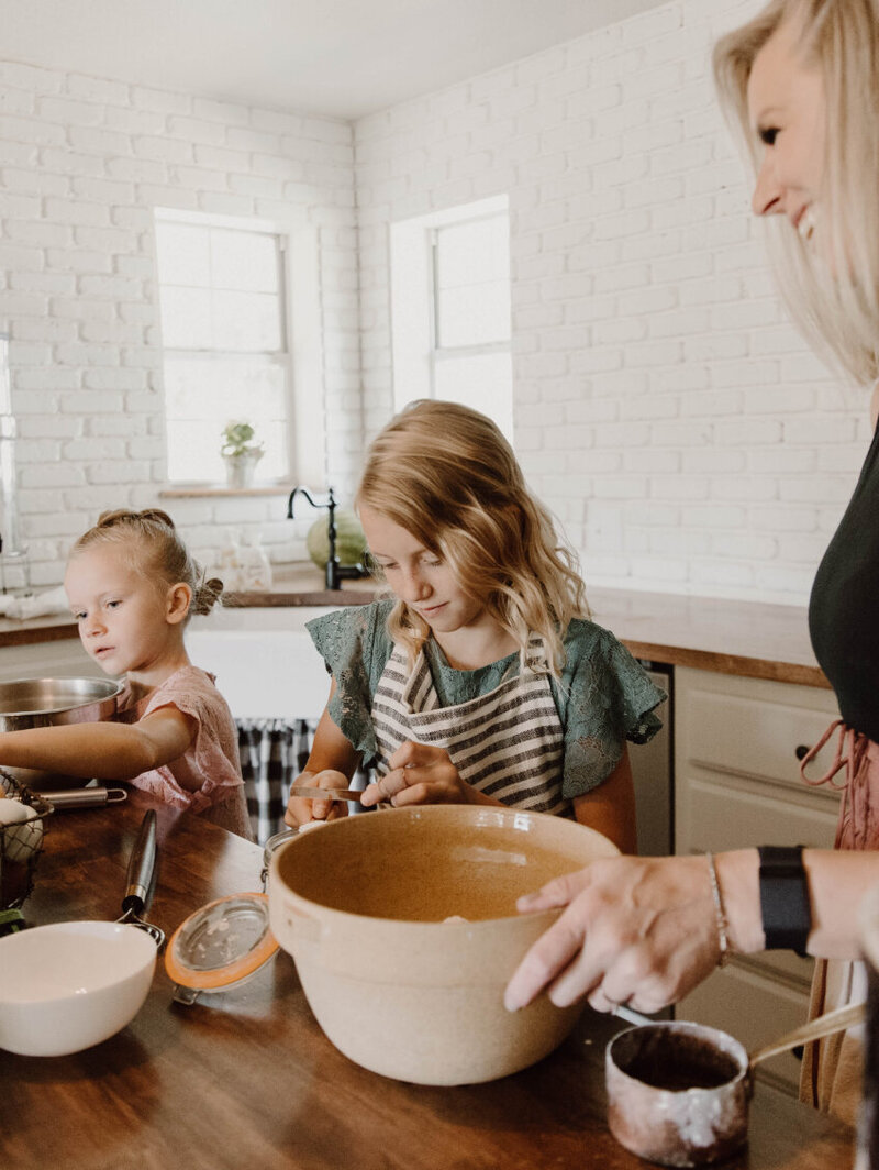 Leslie Burris and her children baking in the kitchen