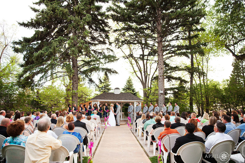 Outdoor wedding ceremony on the lawn with Gazebo at Tapestry House in Fort Collins Colorado
