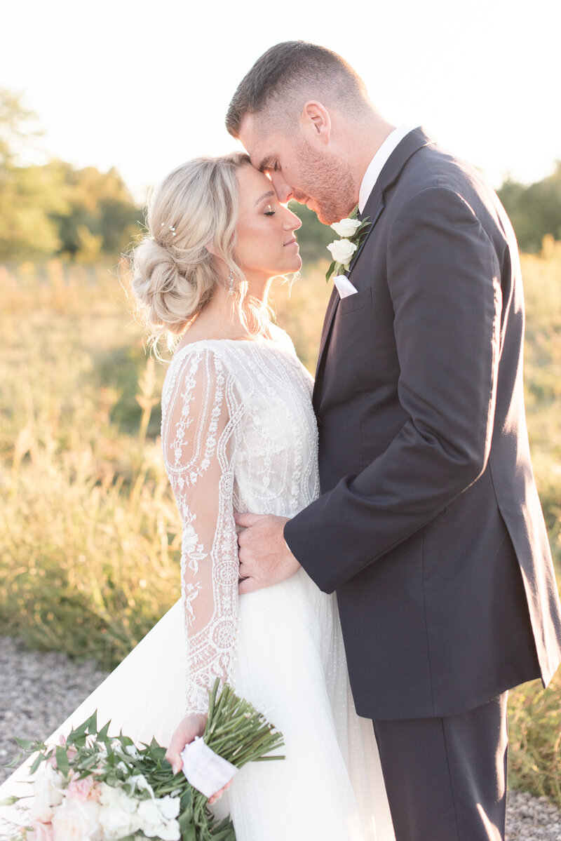 bride and groom portrait at sunset by The Charles Fort Wayne Wedding Photographer Courtney Rudicel