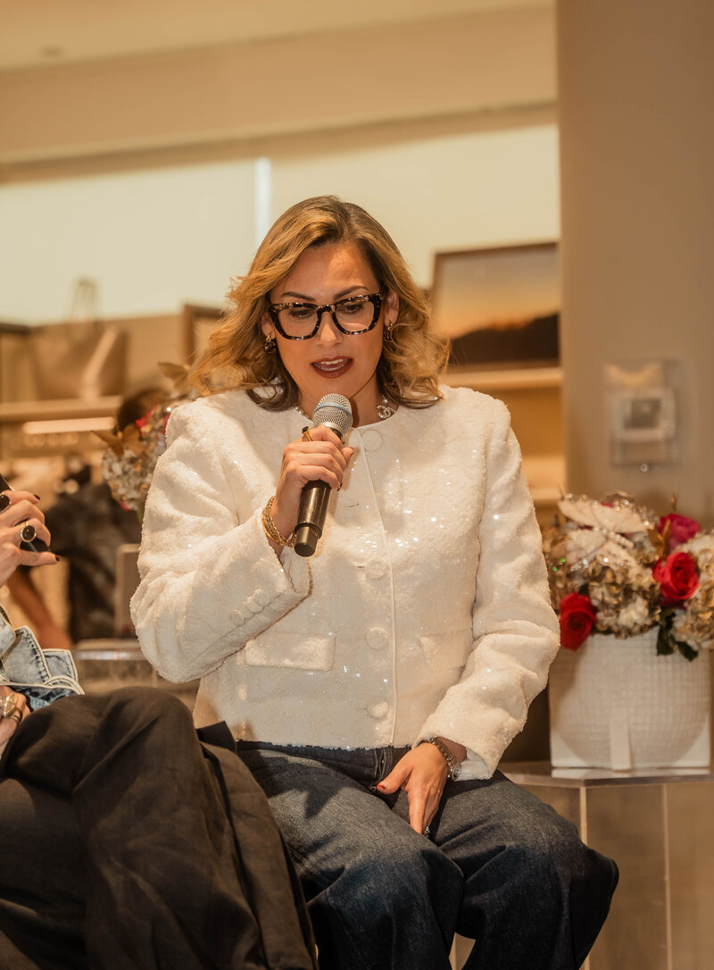 Photo of Jackie speaking at an event