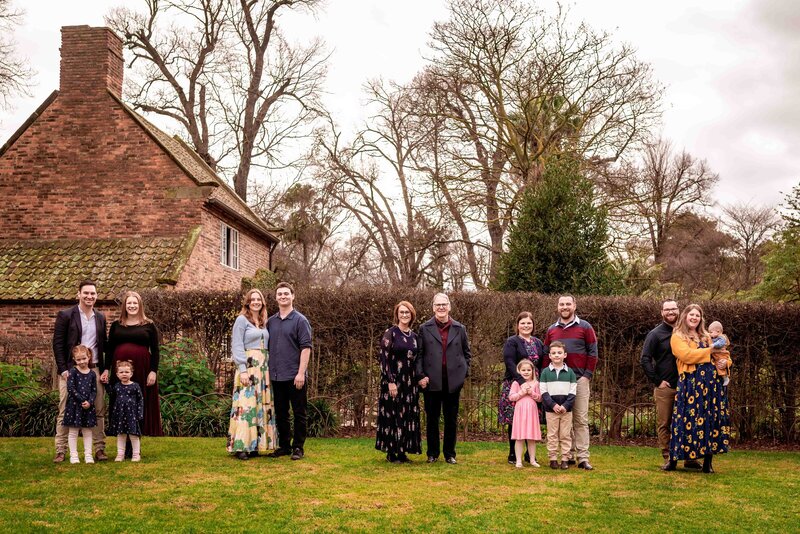 Extended family photographed in East Melbourne park