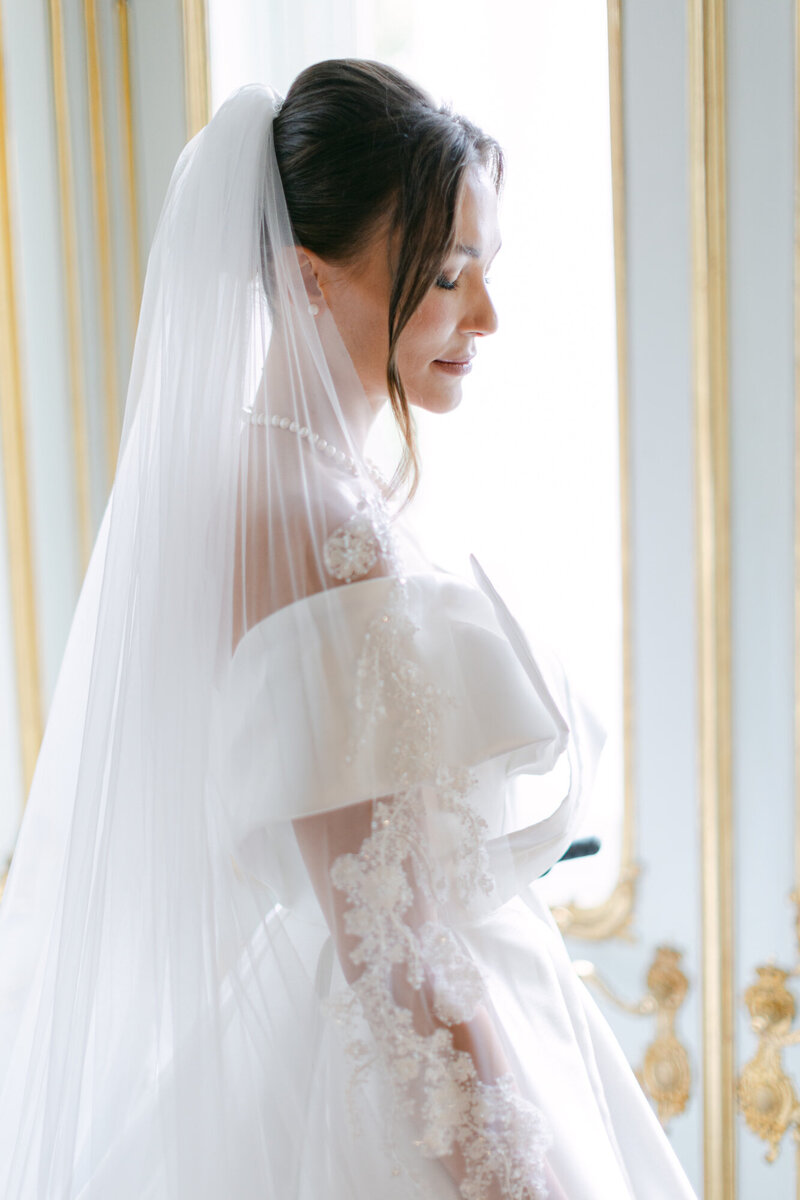 Bride in Haut Couture dress minutes before walking down the aisle at Palace Coburg in Vienna
