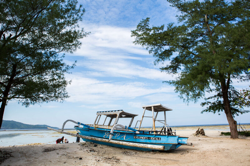 boat on shore in Gili Islands