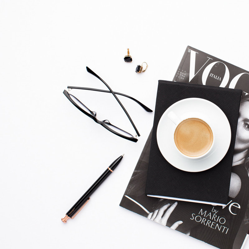 Vogue magazine and a coffee cup