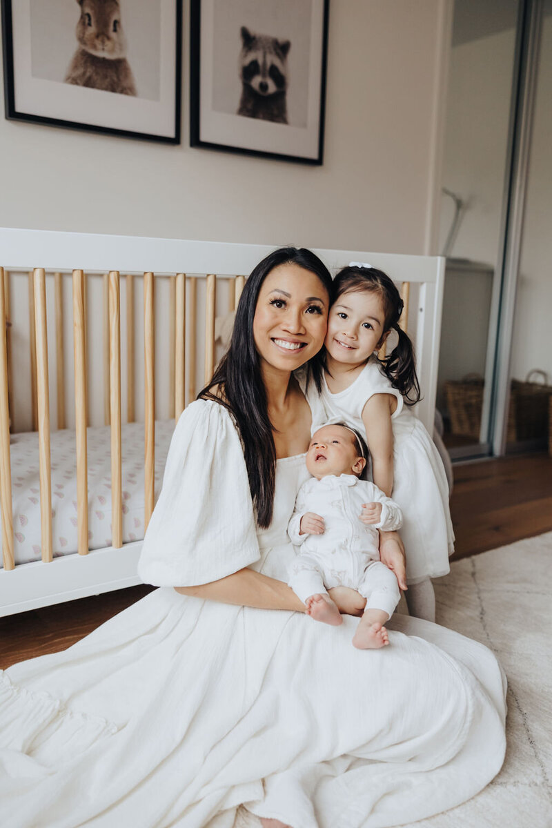 Mom with daughter in white