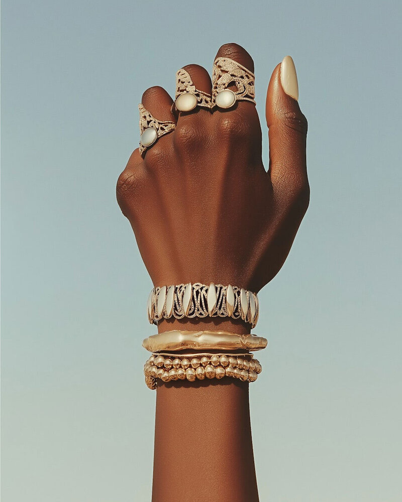 Hand-with-Gold-Jewelry