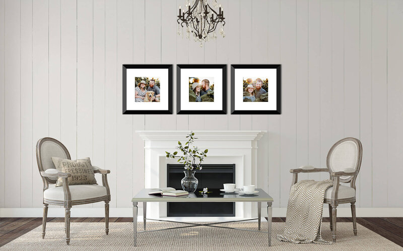 living room with framed couples photos hanging above the fireplace