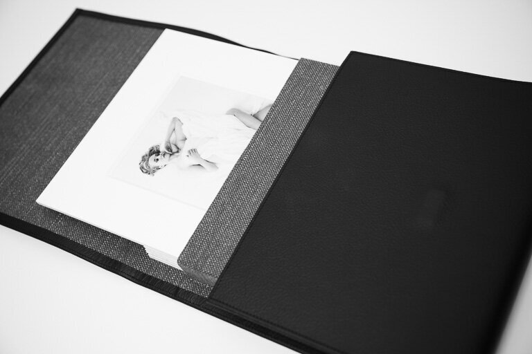 Open photo portfolio with prints visible