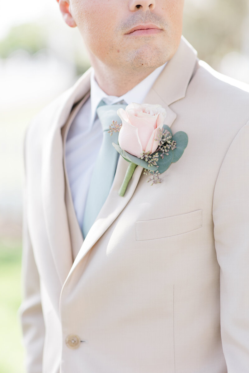 close up of groom's suit jacket