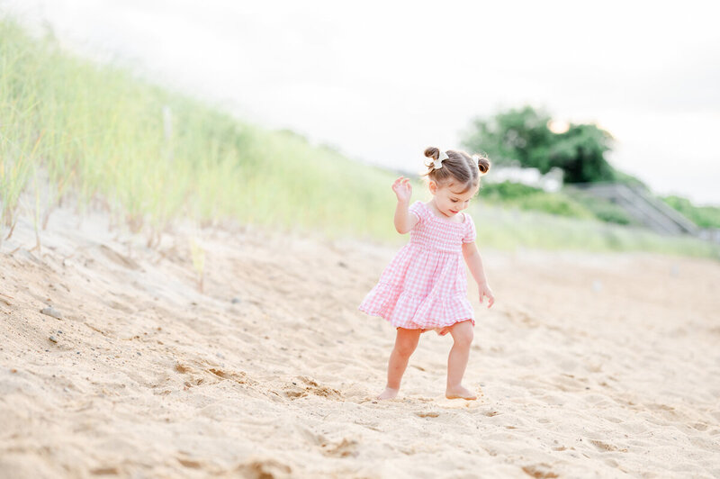 Nicoles daughter playing on the beach