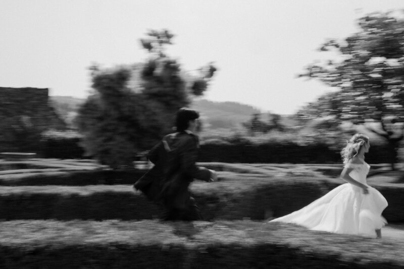 A person chasing their partner on their wedding day 