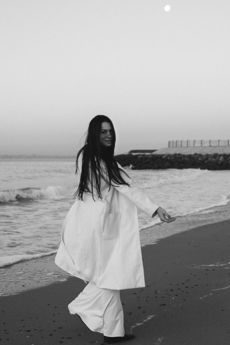 Woman walking on beach