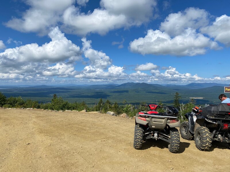 two four wheelers on a hill