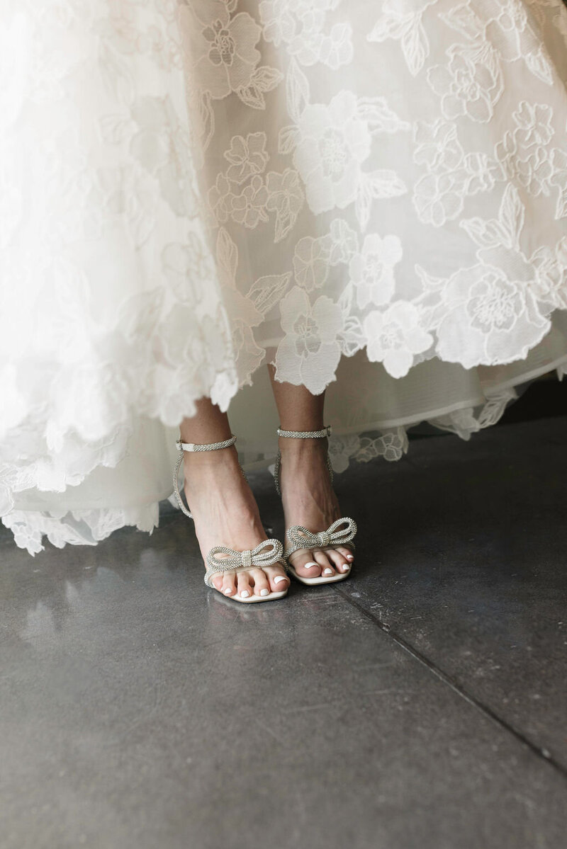 bride wearing white lace wedding dress