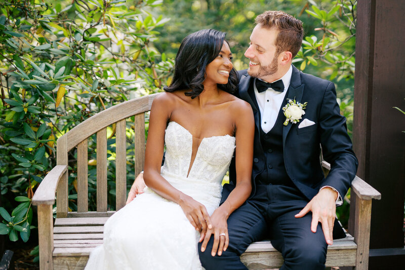 Bride and groom laugh at Rodin Museum