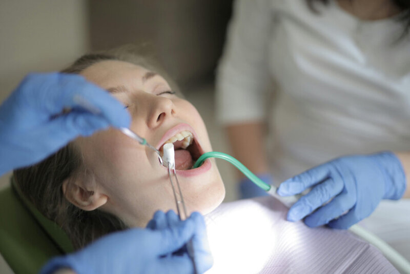 A client getting periodontal therapy at Desert Hills Dental to help periodontal disease and gum disease.