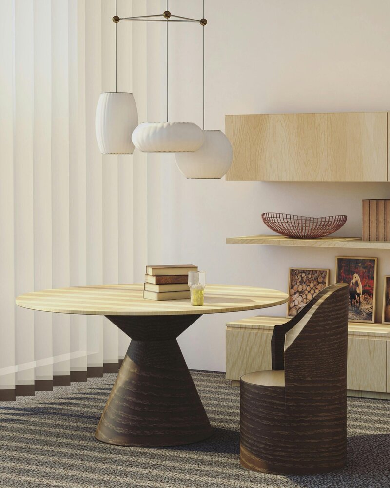 A chic dining area with modern lighting and minimalist decor, exemplifying Signature Renovating's expertise in contemporary interior design.
