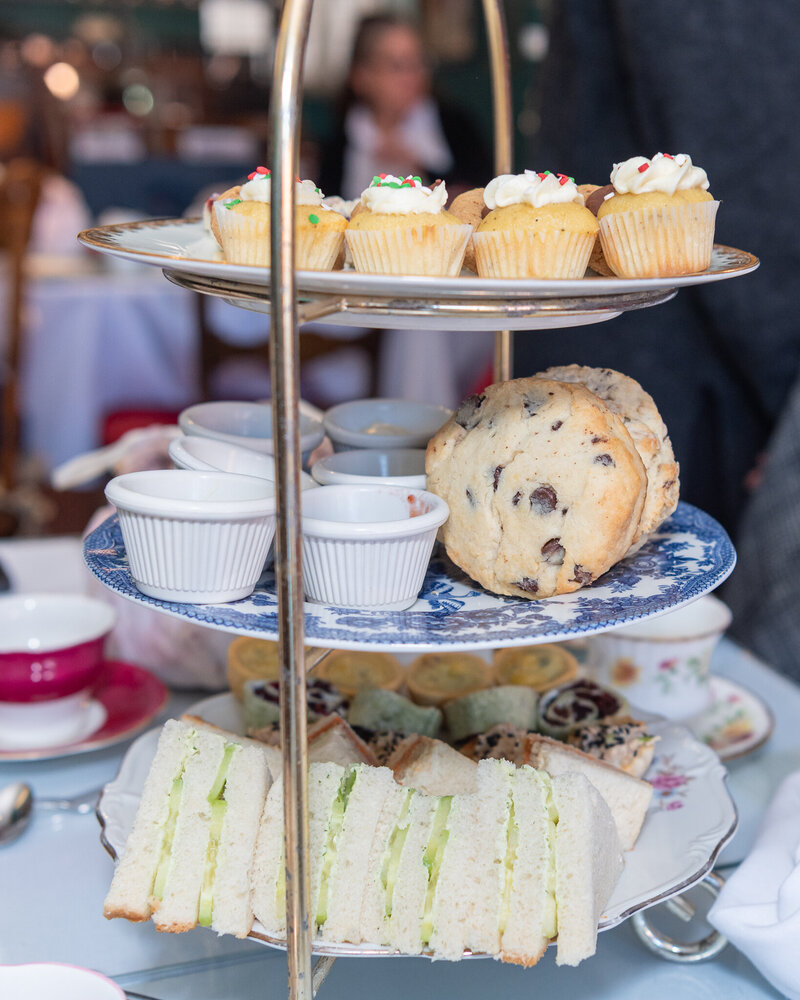 A high tea tier of food.
