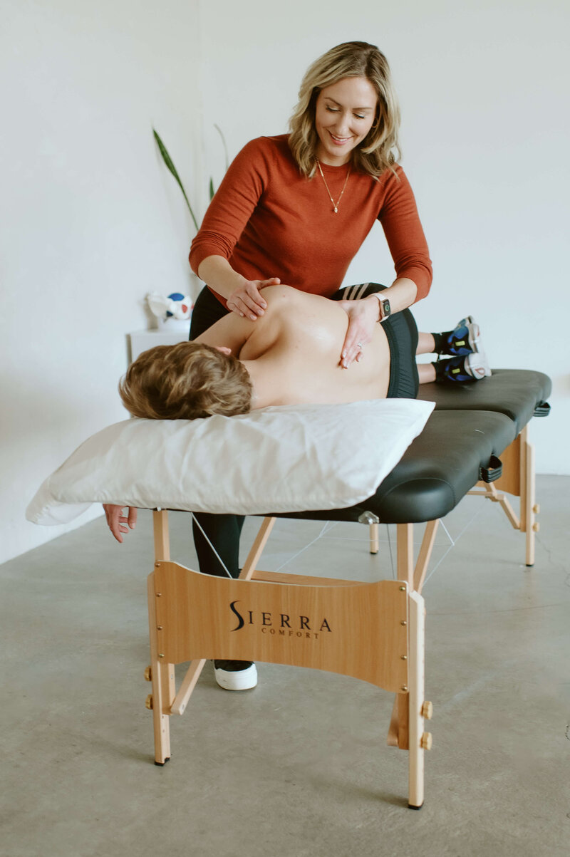 Dr. Gwen works with elite siwmmers to improve shoulder pain