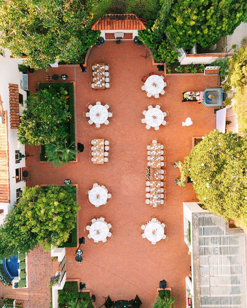 Drone photo of wedding reception details at Darlington House in La Jolla, California.