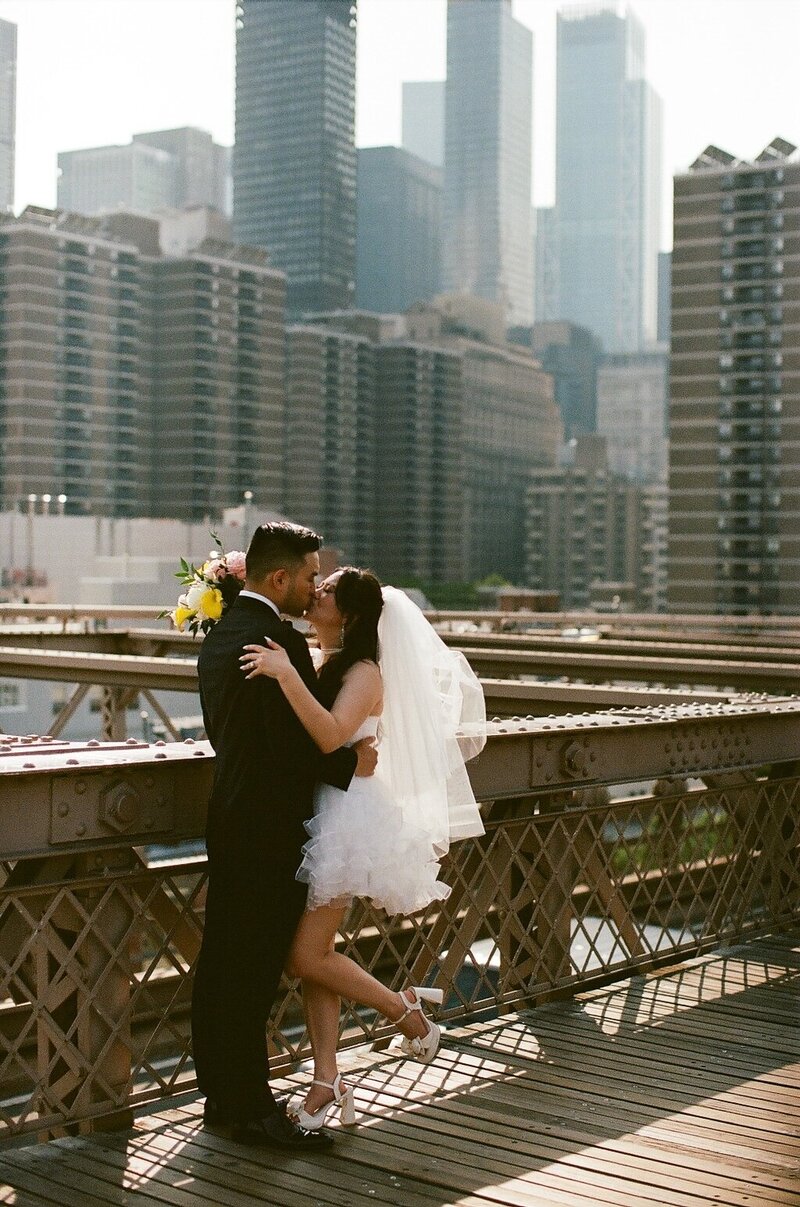 film photo of couple on brooklyn bridge
