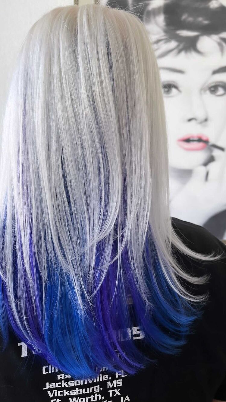 platinum blonde hair with blue and purple underneath