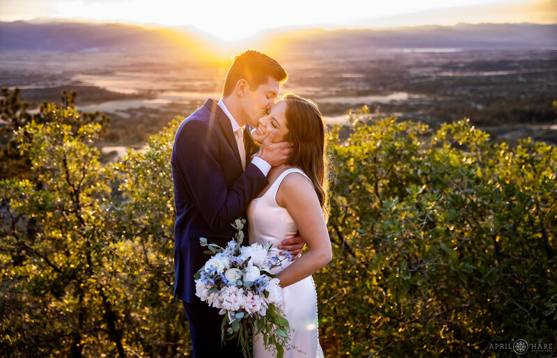 Gorgoeus sun soaked romantic wedding photo at Sunset at Cherokee Ranch and Castle in Colorado