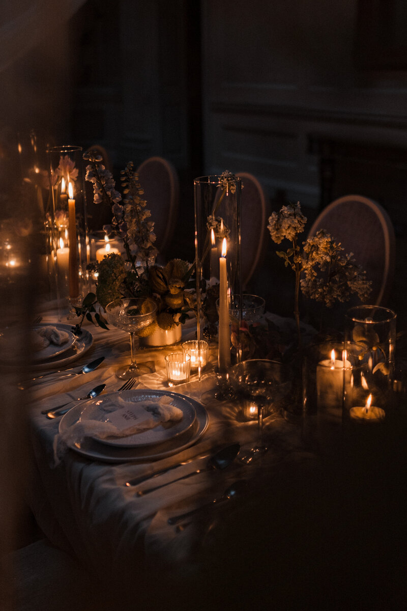 Wedding photographer captures couple taking a stroll hand in hand at their french chateau wedding.