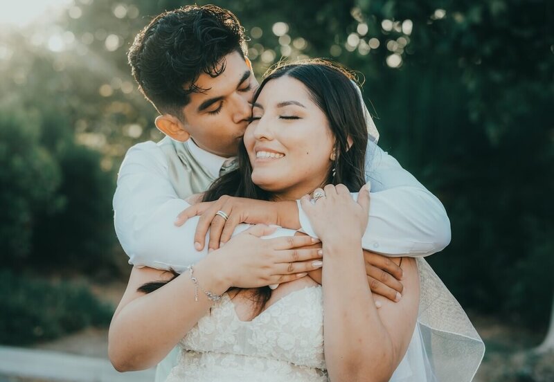 A romantic moment shared by a young couple just married in Paso Robles, California.
