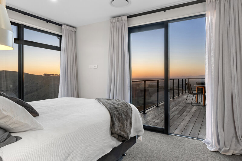 master bedroom with hill view